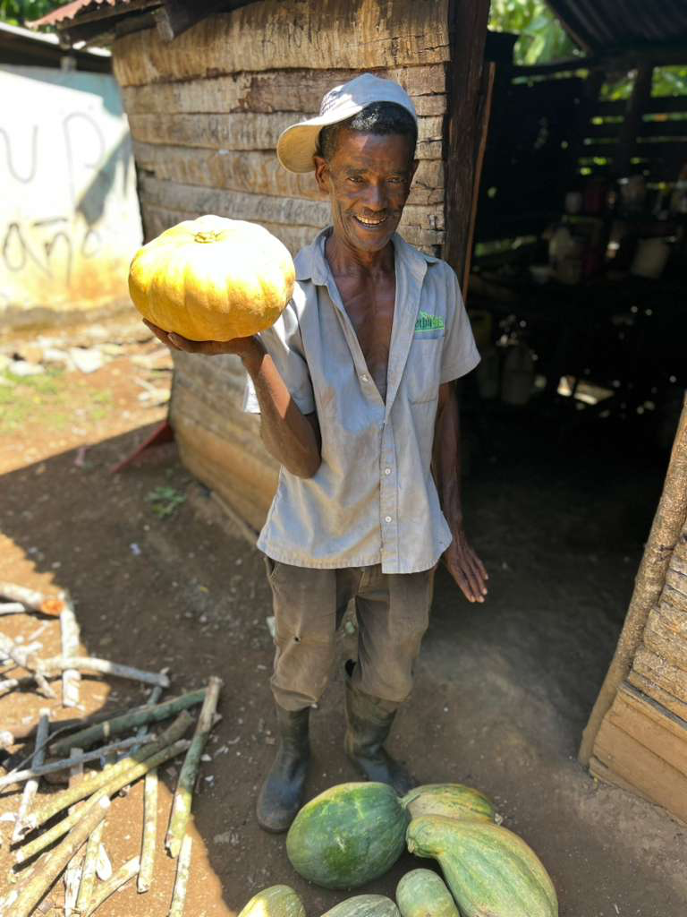 Tomás, who raises pumpkins, cacao, plantains, and coffee Tomás, who raises pumpkins, cacao, plantains, and coffee